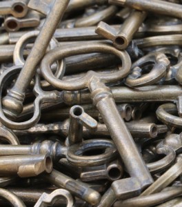 bunch of old brass and bronze keys for sale at flea market